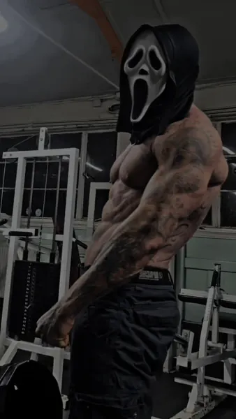 Zade, ghostface. Shirtless side profile in the gym.